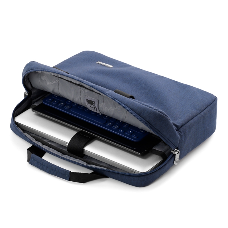 Ngăn chính của túi có ngăn chống sốc laptop, ngăn ipad, ngăn để tài liệu, sách vở